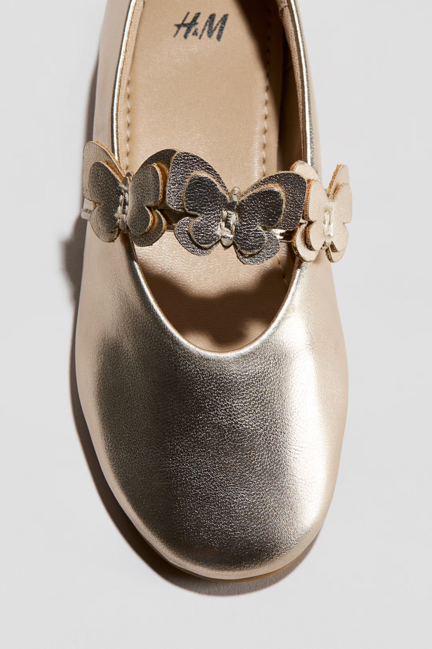 ZAPATILLAS DORADAS NIÑA MARCA H&M